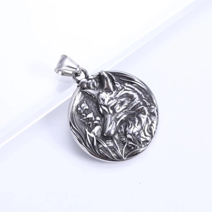 Detailed view of vintage stainless steel round pendant featuring an embossed wolf head icon