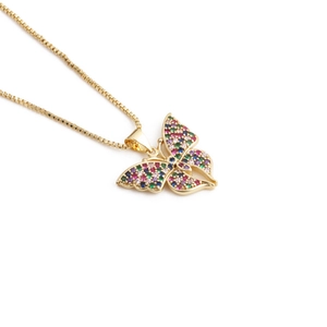 Elegant gold butterfly pendant necklace with colorful zircon stones on a box chain