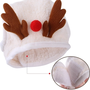 Detailed view of plush reindeer pet hat with adjustable Velcro strap closure