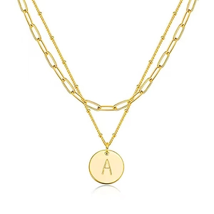 Double-layered gold stainless steel necklace with paperclip chain and initial A pendant