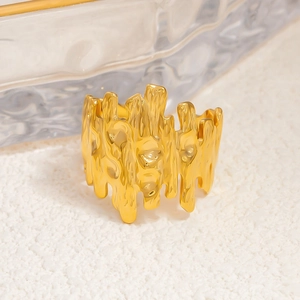 Macro shot of 18k gold plated stainless steel ring with unique melted texture design