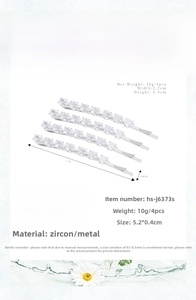 Close-up of four silver rhinestone hair clips with teardrop zircon stones, size 5.2x0.4cm