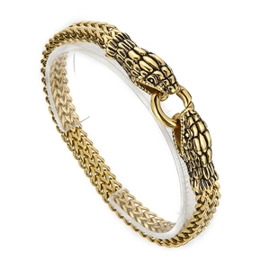 Vue détaillée du bracelet en acier inoxydable doré à double tête de serpent sur support