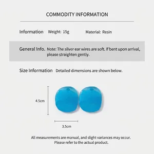 Detail view of large blue resin irregular oval earrings with dimensions of 4.5cm by 3.5cm