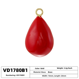 Detail of red enamel waterdrop charm with brass ring and dimensions measurement