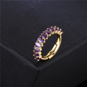 18K gold plated adjustable open ring with eleven oval-cut purple cubic zirconia stones