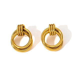 Detailed close-up of polished 18K gold-plated stainless steel triple interlocking hoop earrings
