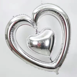 Silver double-heart foil balloon with a shiny metallic finish for romantic events