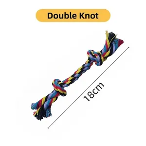 Close-up of 18cm cotton dog rope toy with double knots and colorful braided textures