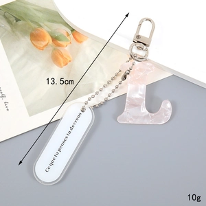 Pink marble acrylic letter L keychain with French plate and metal D-ring clasp