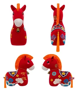 Four-way detailed views of a red Chinese style plush horse with gold embroidery.