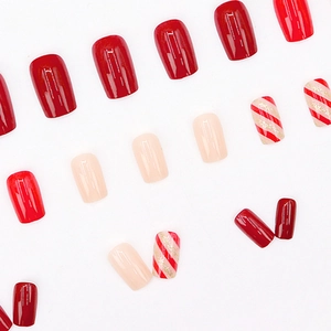 Glossy red and pink square press-on nails with Christmas gold glitter stripe patterns