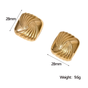 Detailed view of 28mm golden square spiral earrings with textured finish weighing 9.6g