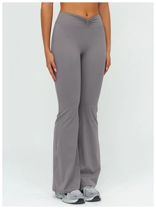 Close-up of V-shaped high-waisted pleated waistband on dark grey flare yoga leggings