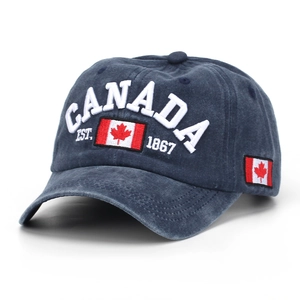 Close-up of CANADA embroidery and maple leaf flag on washed cotton baseball cap