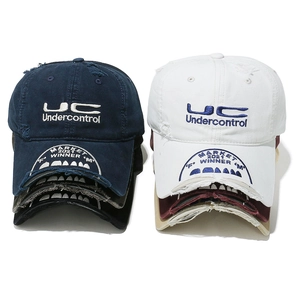 Distressed cotton baseball cap with UC embroidery and vintage torn brim style