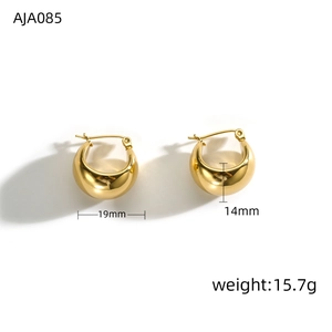 Detail view of gold chunky oval hoop earrings with size 19x14mm and weight 15.7g specs