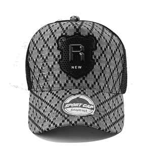 Macro detail of checkered baseball cap with R shield embroidery and mesh back
