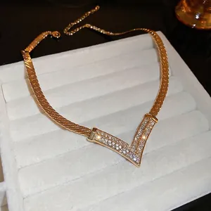 18K gold plated V-shaped pendant necklace with sparkling pavé cubic zirconia