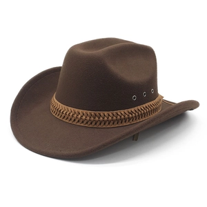 Detail of brown felt western cowboy hat with braided leather band and metal eyelets