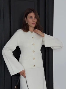 White knit cardigan and skirt set with bell sleeves and single-breasted buttons