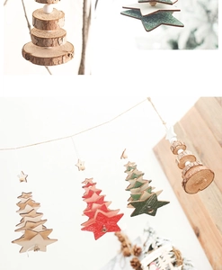 Close-up of handmade wooden star and tree ornaments with rustic bark and beads