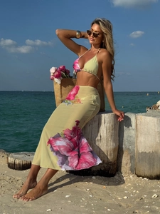 Three-piece floral bikini set with yellow hibiscus print mesh maxi skirt for beach vacation
