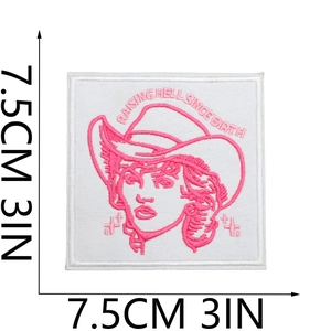 Detail of square embroidered patch with 7.5cm measurement lines and Raising Hell text