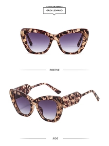 Detail view of cat eye sunglasses featuring grey leopard frames and purple gradient lenses