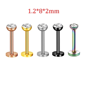 Detail of 1.2mm labret studs in five colors with clear cubic zirconia stone settings