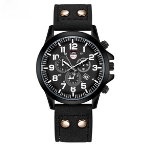 Detail shot of black matte quartz watch with white numerals and three decorative subdials