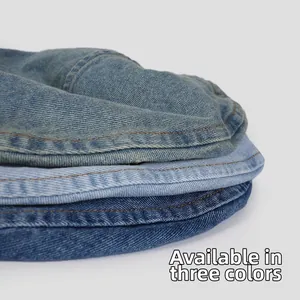 Close-up of three-color vintage denim berets with contrast yellow stitching detail