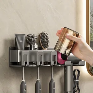 Wall-mounted gunmetal bathroom organizer for toothbrushes and hair dryer in sleek metal finish