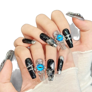 Gothic punk black coffin press-on nails with silver snake relief and blue evil eye charms