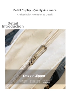 Macro shot of smooth metal zipper and neat stitching on beige waterproof canvas bag