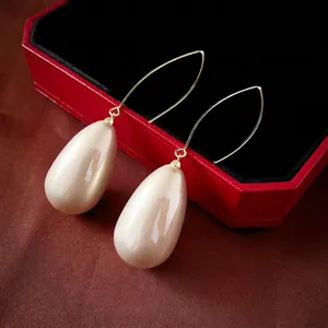 French style gold hook earrings with elegant teardrop champagne pearls for women