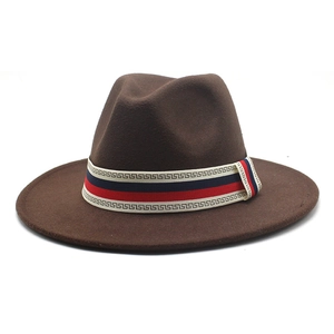 Detail of dark coffee wool felt fedora featuring a Greek key patterned decorative band