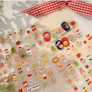 Macro detail of TS-4224 Christmas nail art stickers featuring 3D embossed holiday patterns