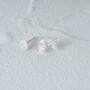 Detailed macro view of S925 sterling silver star stud with sparkling cubic zirconia stones