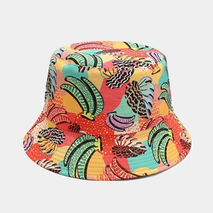 Detail shot of the vibrant tropical banana print and canvas fabric on this sun hat
