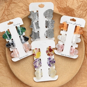 Mini acetate hair clips set in heart and star shapes with elegant marble textures