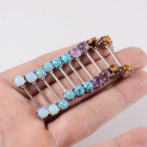 Stainless steel nipple barbells featuring colorful opal and gemstone decorative spheres