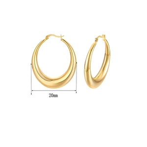 Detail view of 20mm chunky golden hoop earrings with high-polish mirror finish surface