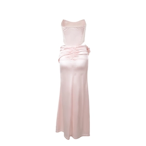 Detail of light pink satin two-piece formal dress with strapless corset and long skirt