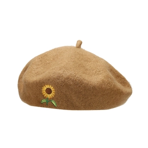 Brown wool beret hat with detailed sunflower embroidery and classic top stem detail