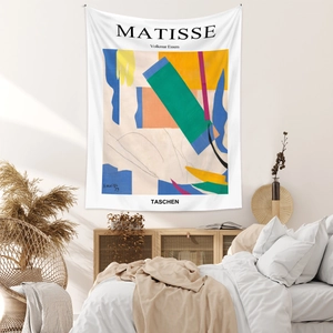 Detail of Henri Matisse style tapestry hanging in a minimalist bedroom background