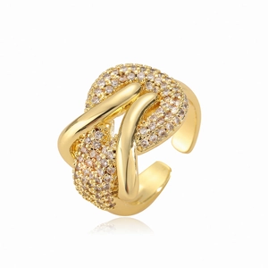 Irregular gold twisted open ring with pavé cubic zirconia for an elegant look