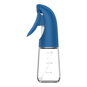 Blue glass oil sprayer for air fryer with 150ml measurement scale on white background