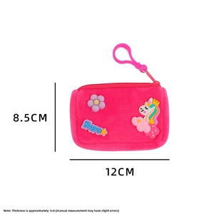 Detail view of pink plush unicorn coin purse showing dimensions and plastic clip