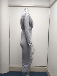 Detail of grey long sleeve slim fit knit dress featuring elegant bodycon silhouette